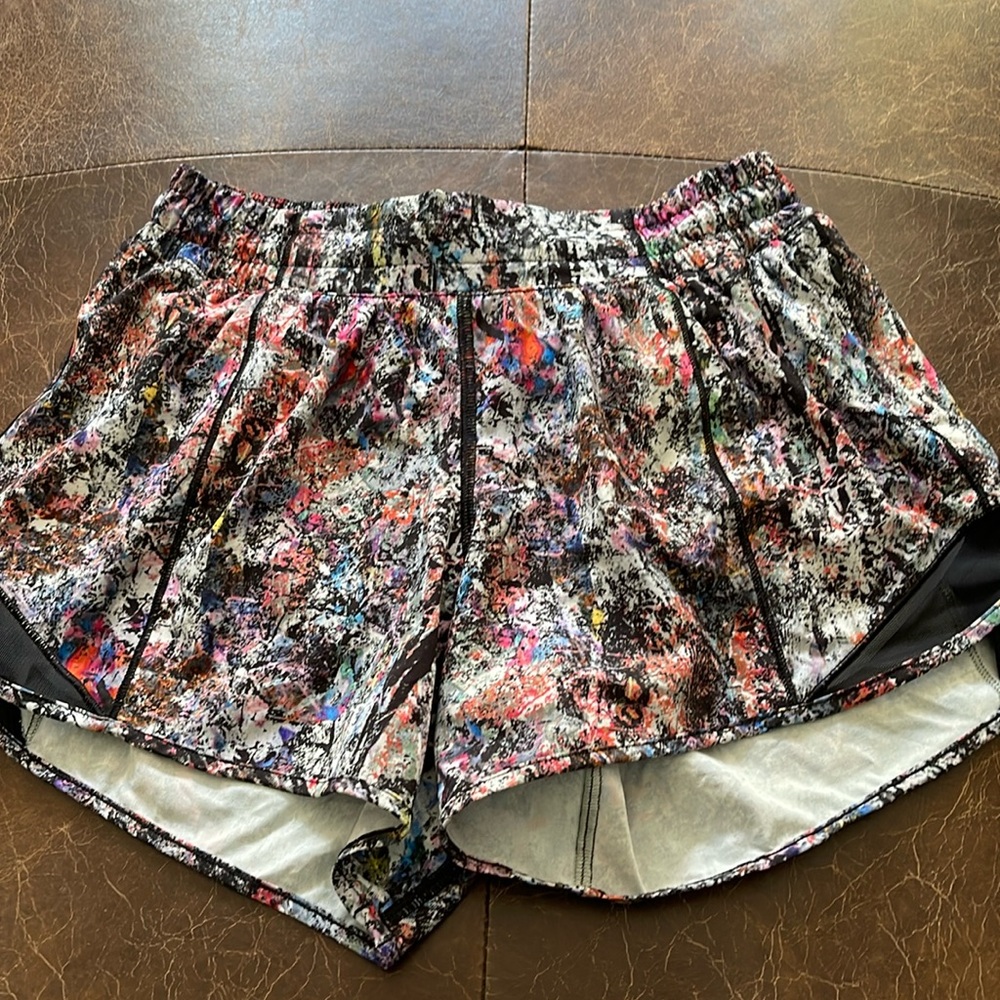 NWOT Lululemon multi color running shirt with built in panty Size 6 Tall